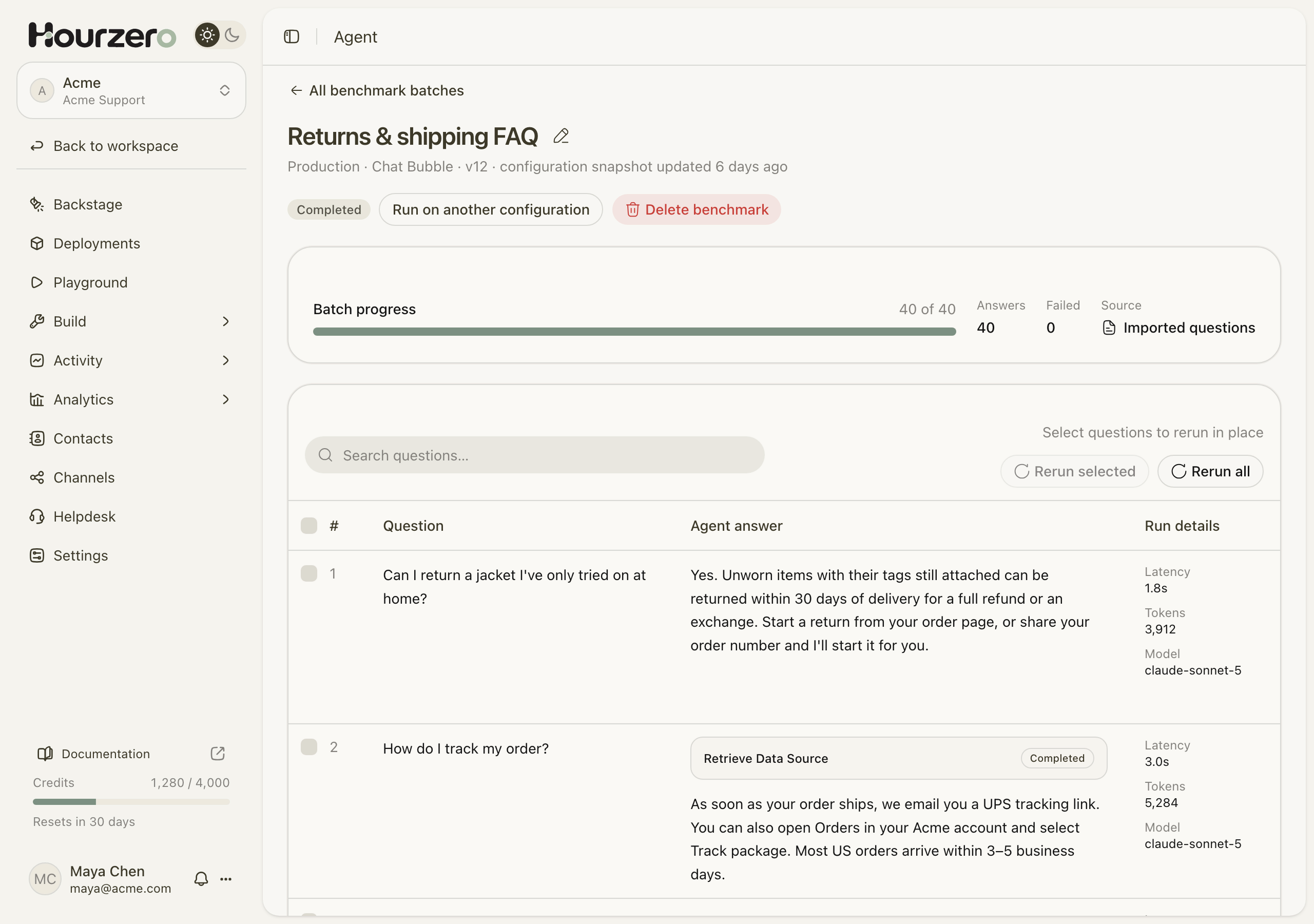 A finished benchmark batch with 40 of 40 questions answered, showing each question, the agent's answer, and run details