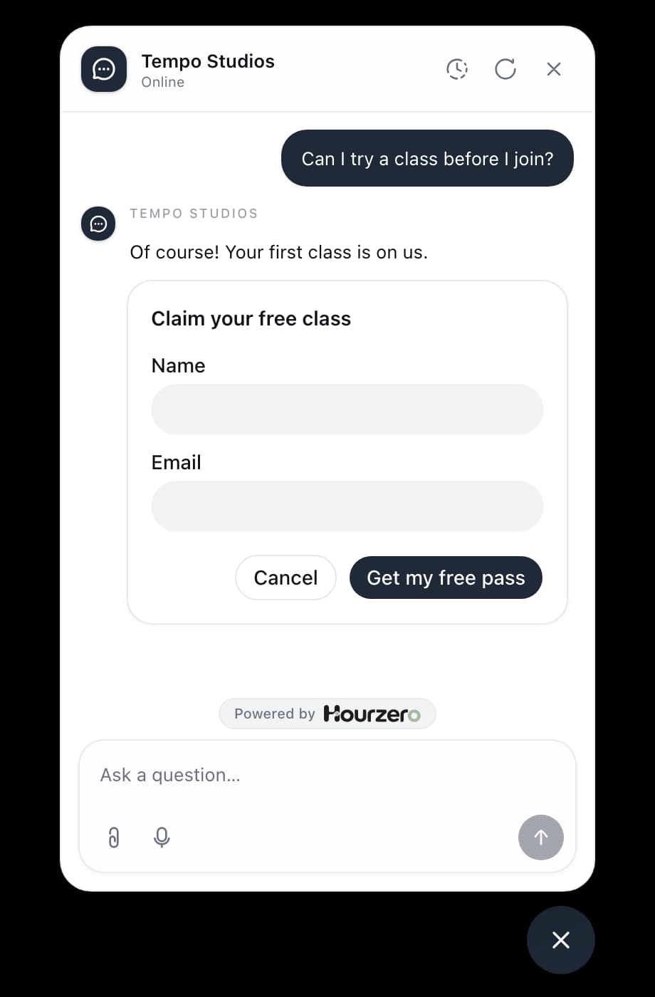 A chat where a fitness studio's agent shows a Claim your free class form
