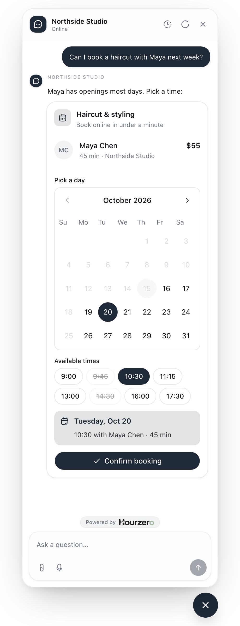 The agent offering a haircut booking card with a calendar, available times, and a Confirm booking button